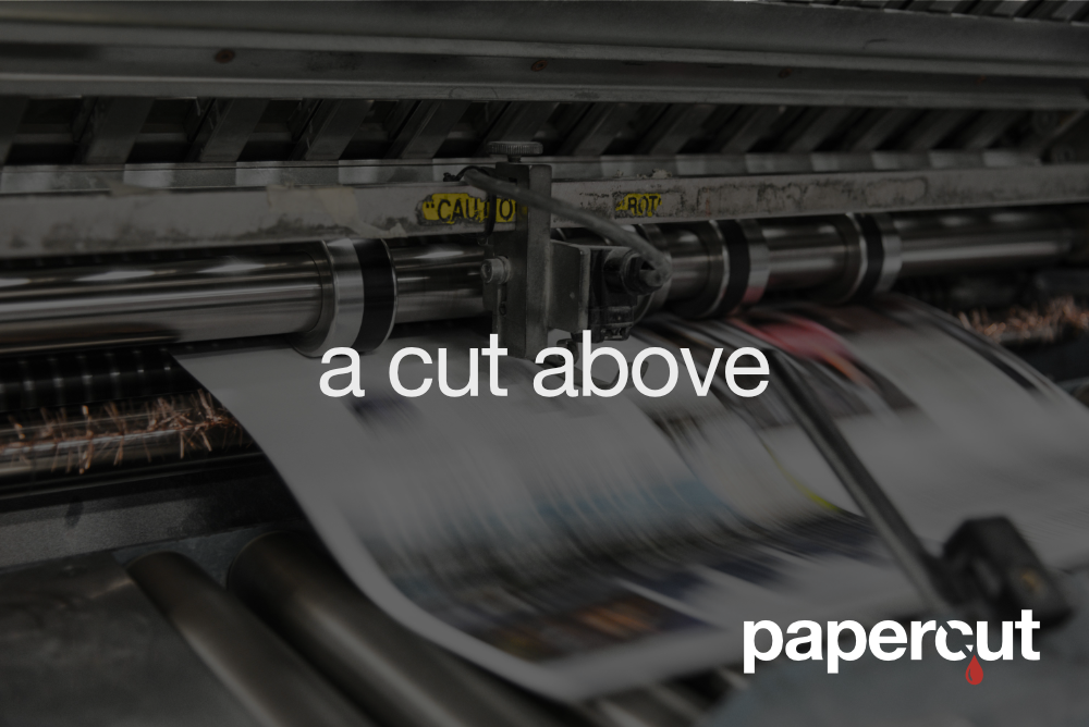 Papercut launch creative: 'a cut above' campaign artwork featuring a printing press in motion